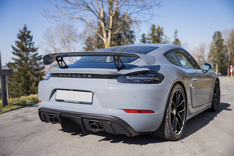 Right back Porsche Cayman GT4 on Lake Constance