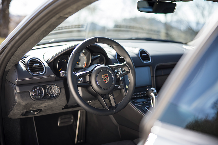 Interior features Porsche Cayman GT4 on Lake Constance
