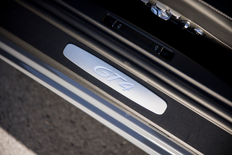 Model Logo Porsche Cayman GT4 on Lake Constance