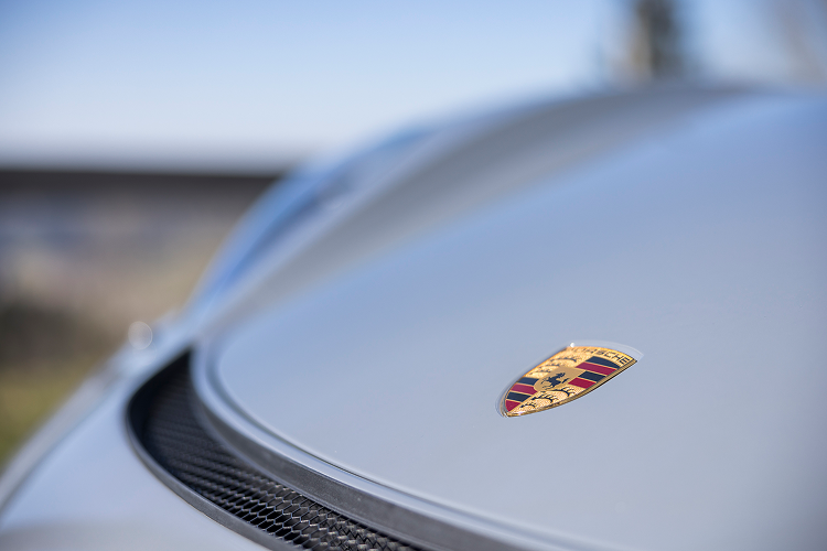 Logo Porsche Cayman GT4 on Lake Constance