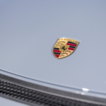 Brand Logo Porsche Cayman GT4 on Lake Constance