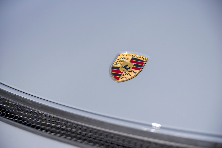 Brand Logo Porsche Cayman GT4 on Lake Constance
