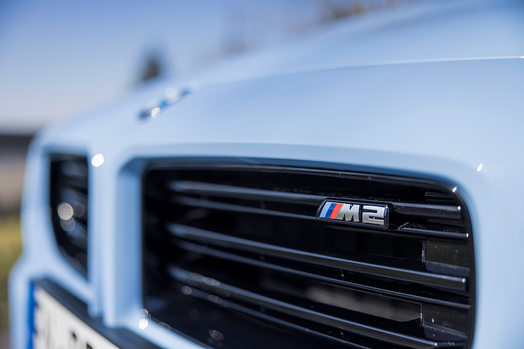 Front left BMW M2 Coupe at Lake Constance